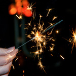 Katharina mit einem Sternwerfer bei der Silvesterparty 2014