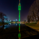 Olympiaturm grün beleuchtet zum St. Patrick's Day