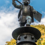 Bronzestatue eines "Mälzerbuben" auf dem Brunnen am Schüleinplatz