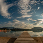 Sonnenaufgang über dem Stag im Strandbad am Faaker See in Kärnten