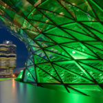 die BMW - Welt in München, grün beleuchtet zum irischen Nationalfeiertag St. Patrick's Day