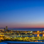 Sonnenaufgnag über Barcelona Beach und Port Vell