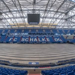 die Einsamkeit ist spürbar in einer vollkommen menschenleeren Veltins - Arena in Gelsenkirchen