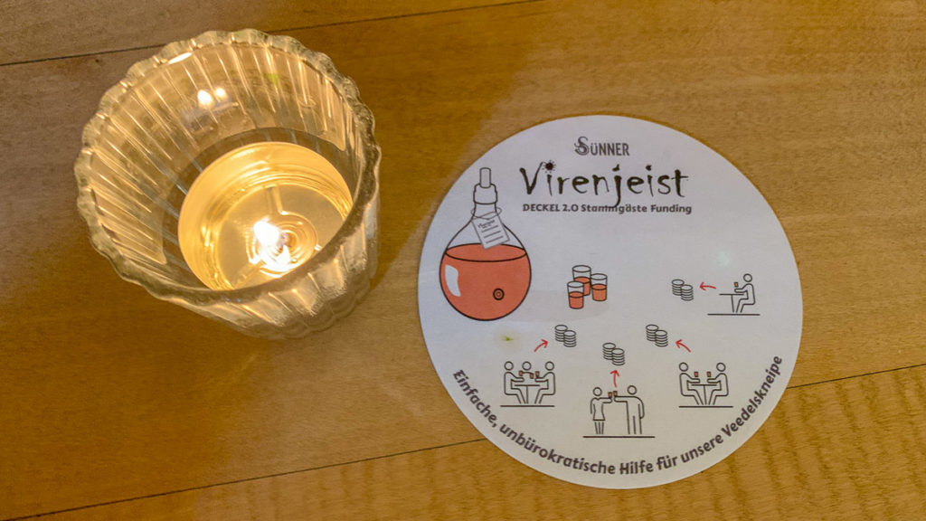 Crowdfunding Bierdeckel im Restaurant in Köln mit dem Virengeist