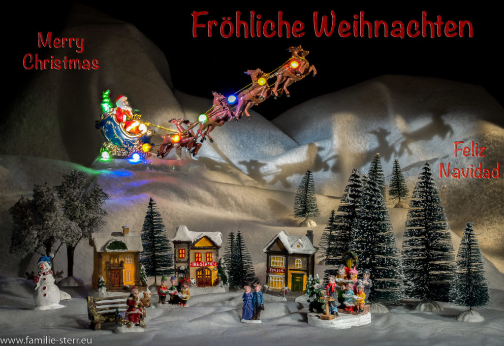 Weihnachten 2022 - Santas Schlitten fliegt über das Weihnachtsdorf